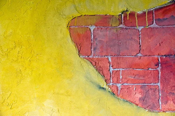 Gipsz sárga és piros brickwall — Stock Fotó