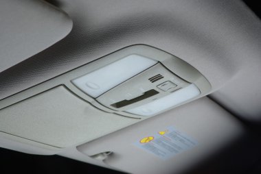 Illuminating control in a car clipart