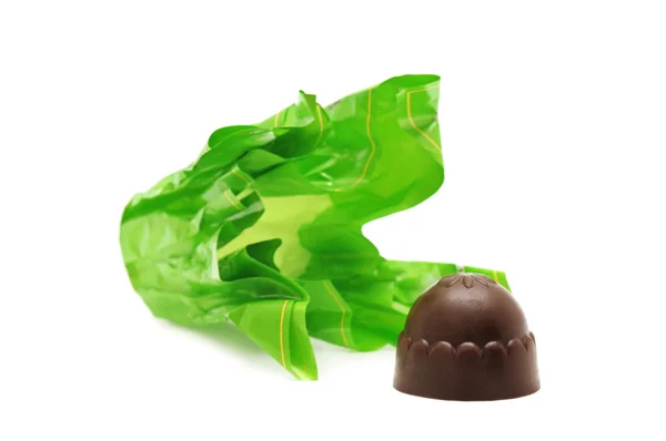Chocolates and candy wrapper — Stock Photo, Image