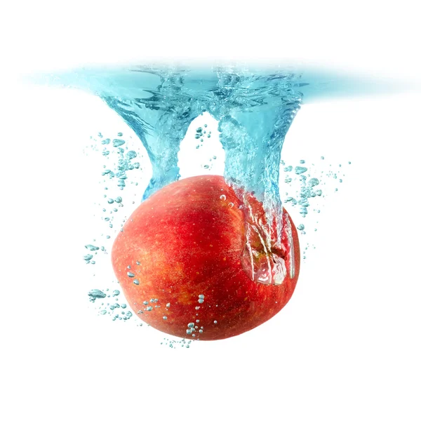 Apple falling into the water — Stock Photo, Image