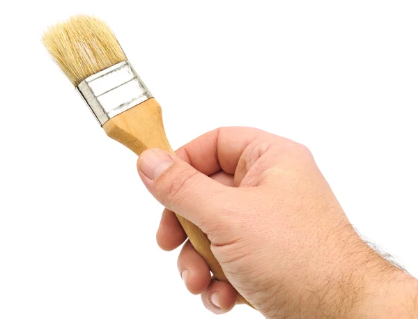 Paint brush in hand — Stock Photo, Image