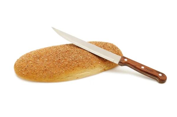 Świeży chleb i kuchni nóż — Zdjęcie stockowe