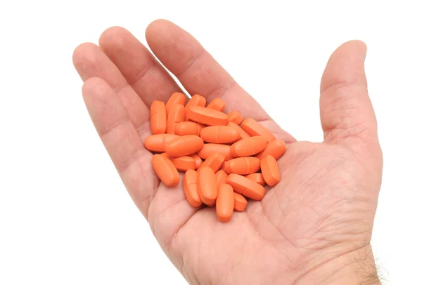 Pill in a hand — Stock Photo, Image