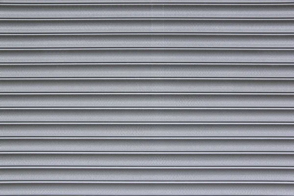 Perforated metal security shutter background — Stock Photo, Image