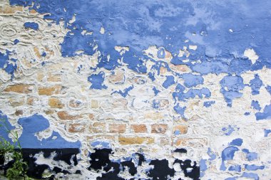 Blue paint peeling brick wall clipart