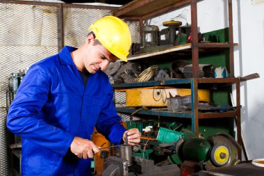 Factory worker in workshop clipart