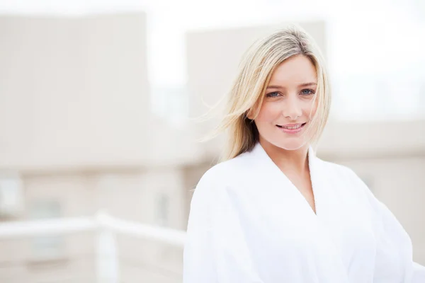 Young woman in bathrobe — Stock Photo, Image