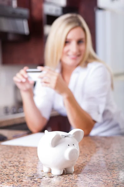 Young woman saving money — Stock Photo, Image