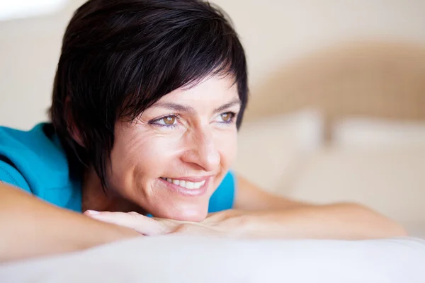 Middle aged woman daydreaming — Stock Photo, Image