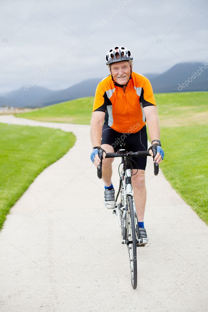 Senior man riding road bicycle
