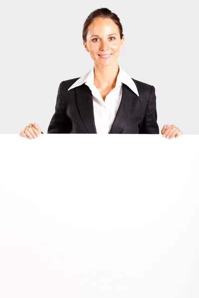 Vacker affärskvinna bakom vit tavla — Stockfoto