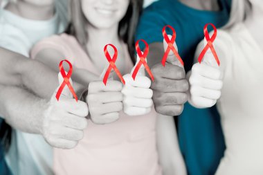Group of young multiracial supporting AIDS HIV prevention clipart