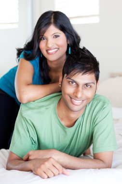 Joyful young indian couple clipart