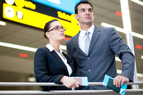 Determined business travellers in airport