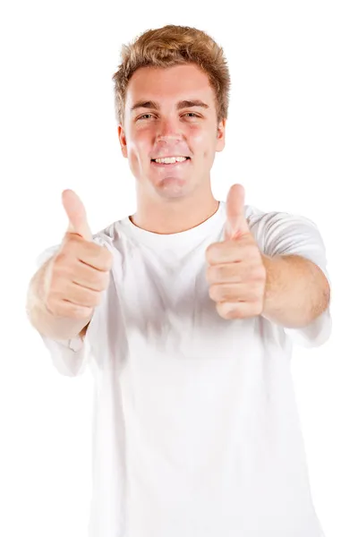 Молодой человек поднимает большие пальцы — стоковое фото