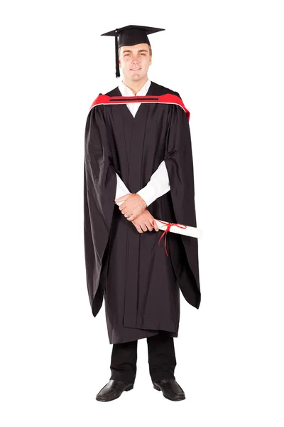 Jovem do sexo masculino graduado em boné e vestido — Fotografia de Stock