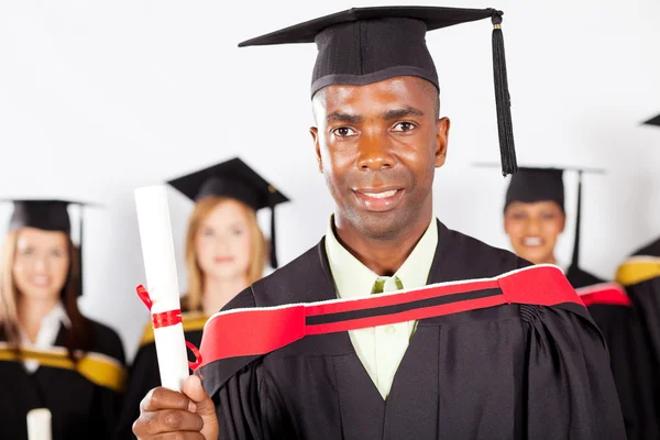 Male african graduate at graduation — Stock Photo, Image