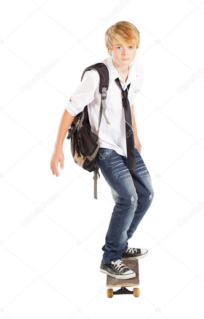 Teen boy on skateboard