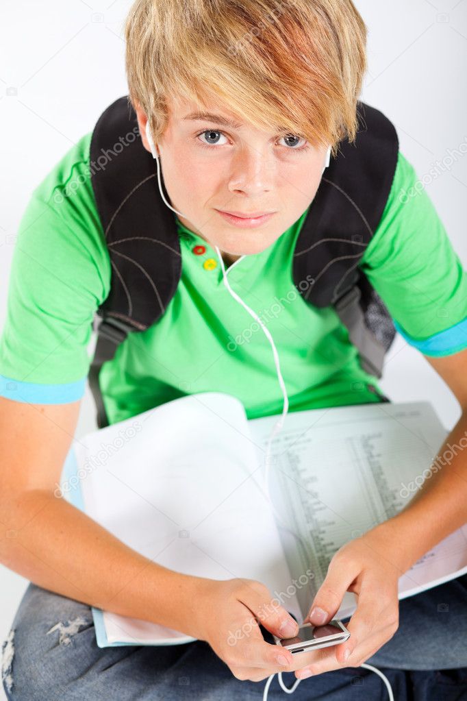 Teen boy with mp3 player