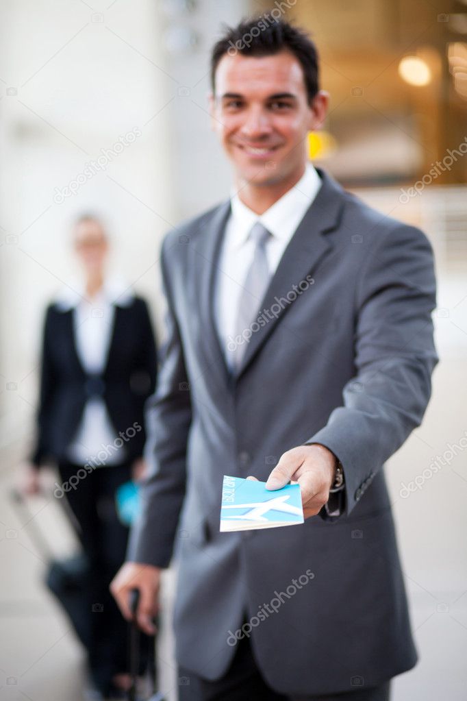 Businessman handing over air ticket