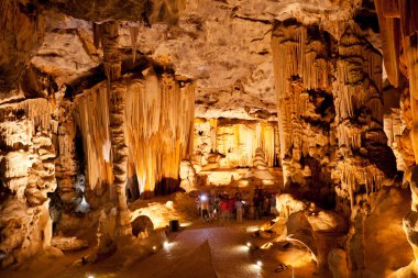 Tourists visiting Cango Caves in South Africa clipart