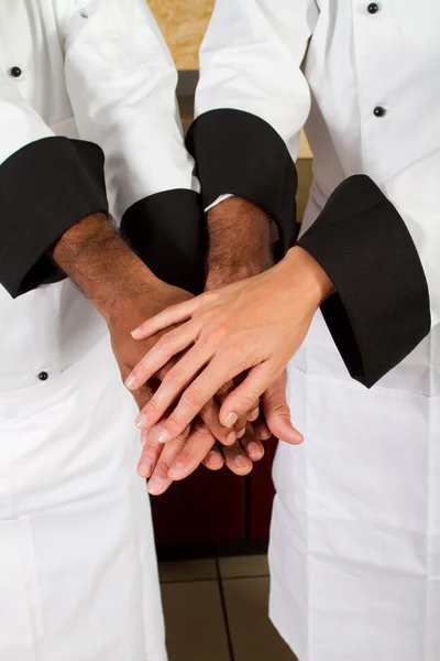 Chefs hands together — Stock Photo, Image