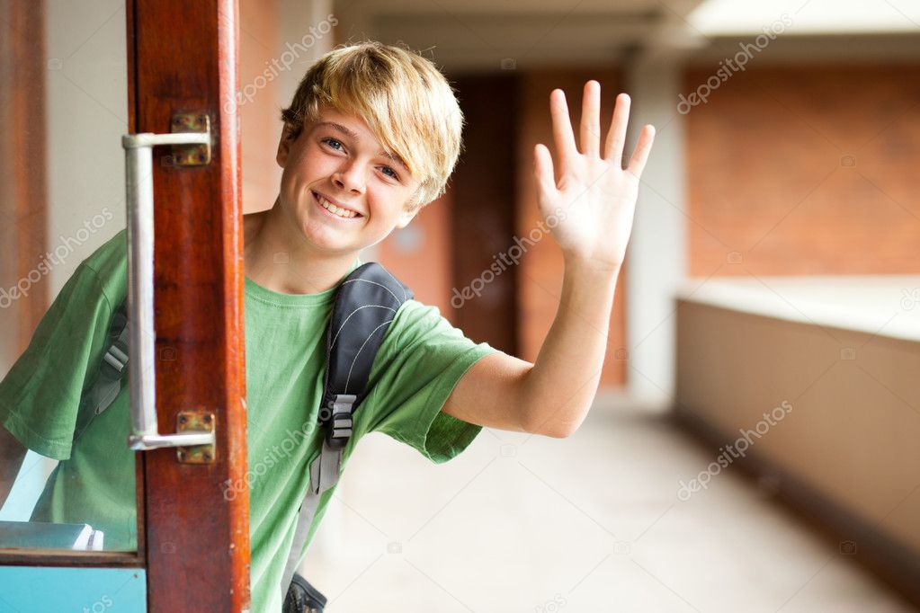 High school boy waving good bye