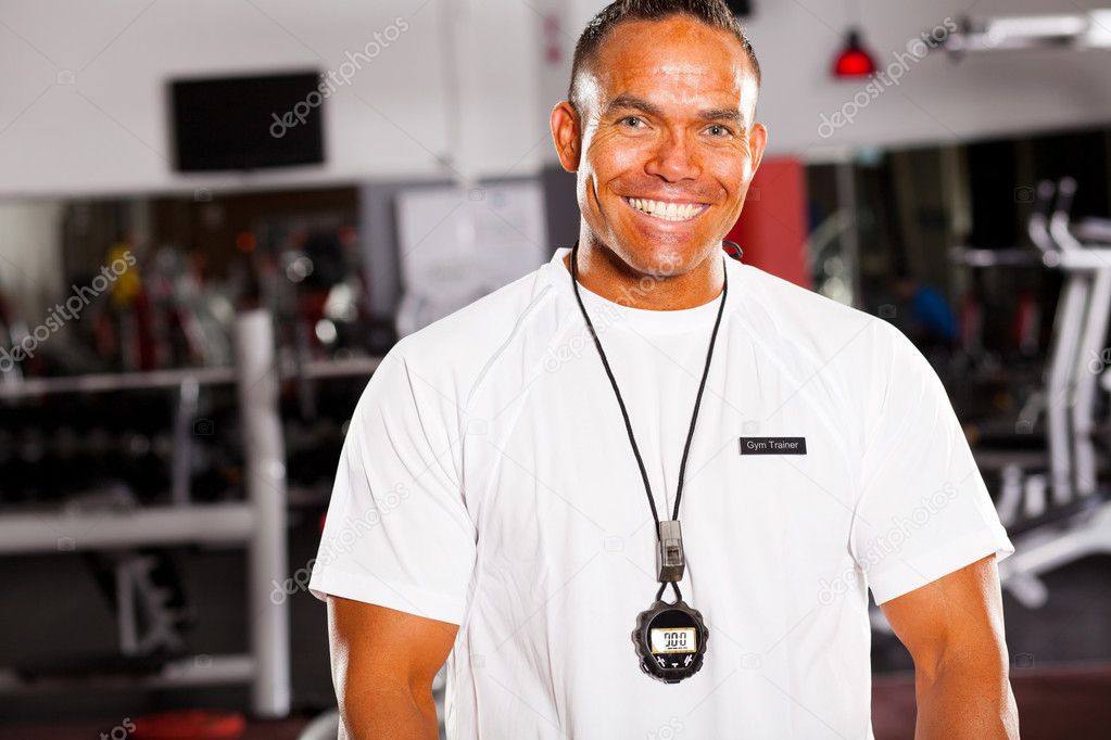 Happy male personal trainer
