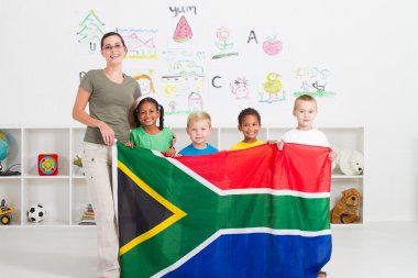 South african kindergarten teahcer and students clipart