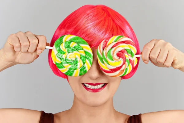 stock image Girl with a charming smile played with candy