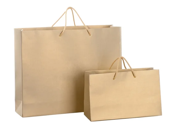 Dva zlaté papírové nákupní tašky — Stock fotografie