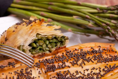 Closeup Of Rolls Of Asparagus In Crust clipart