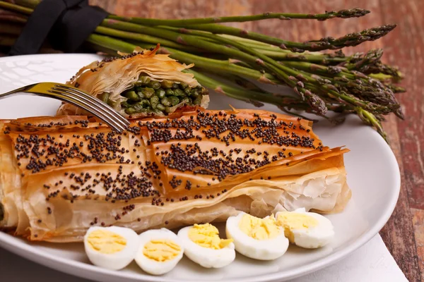 Asparagus In Crust With Poppy Seeds And Quail Eggs — Stock Photo, Image