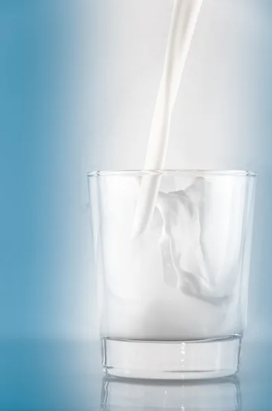 Stock image Pouring milk into a glass