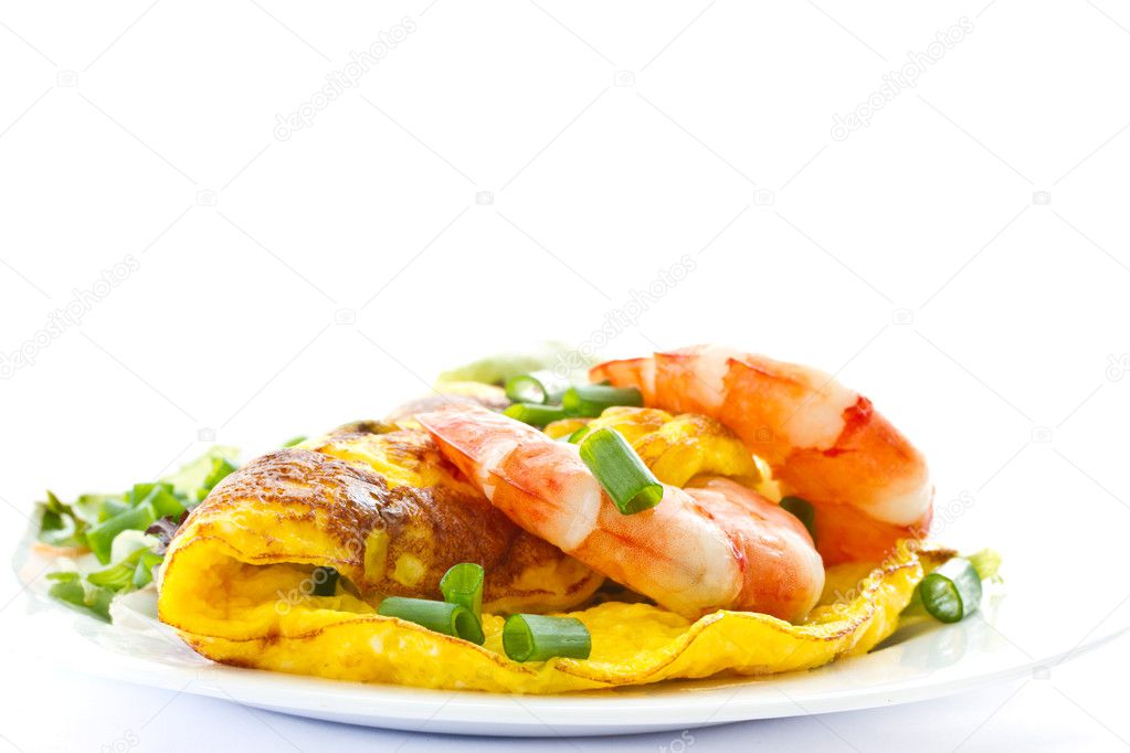 Omelet with cooked shrimp and greens