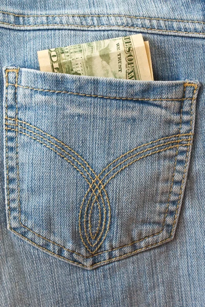 stock image Dollars in the back pocket of jeans