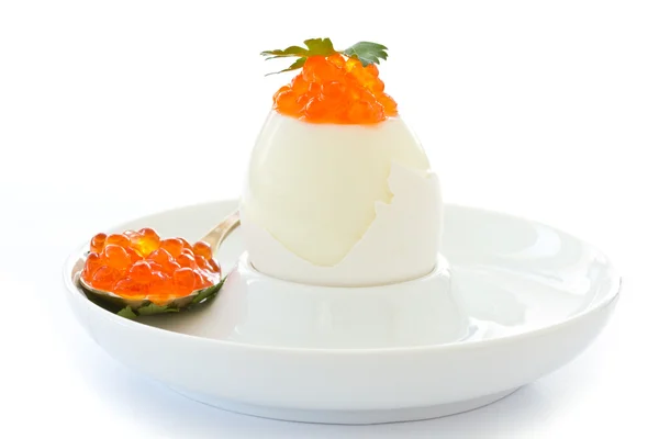 Egg with red caviar — Stock Photo, Image