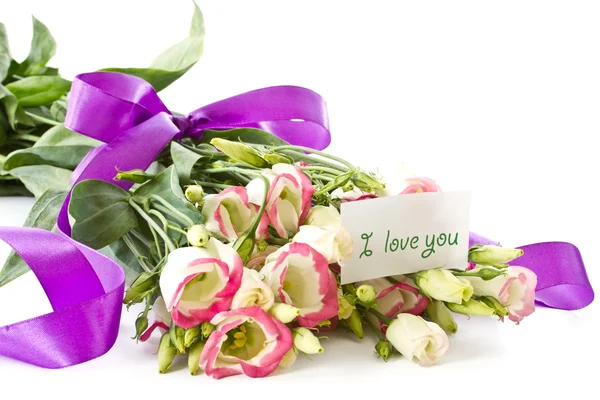 Declaração de amor e um buquê de flores lisianthus — Fotografia de Stock