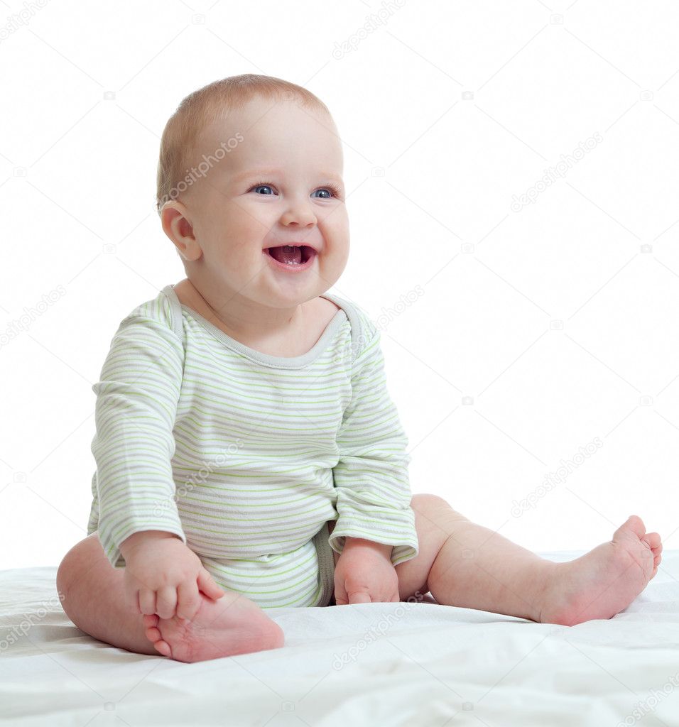 Baby boy isolated sitting smilingly — Stock Photo © Andrey_Kuzmin 8312916