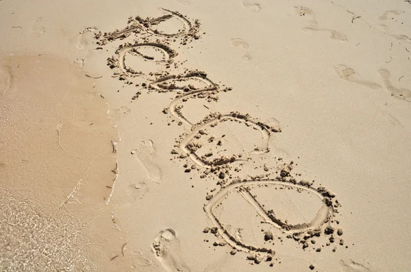 Ordet fred ritning på sand — Stockfoto