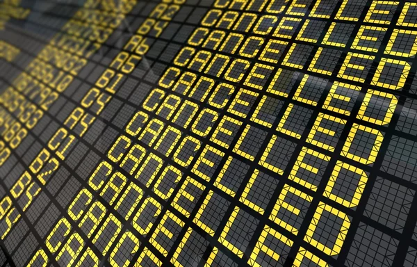 Close-up International Airport Board com voos cancelados Imagem De Stock