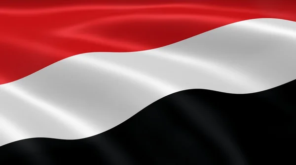 stock image Yemeni flag in the wind