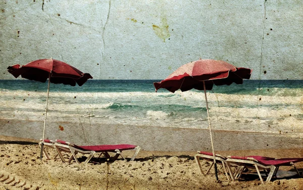Chairs on shore near sea — Stock Photo, Image