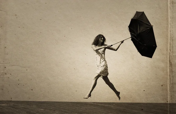 Young girl with umbrella. Photo in old color image style. — Stock Photo, Image