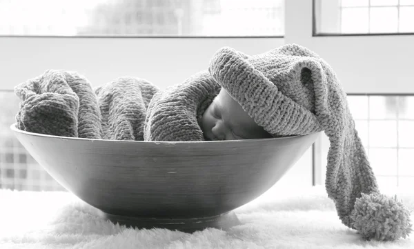 stock image Newborn in a knitted cocoon and hat