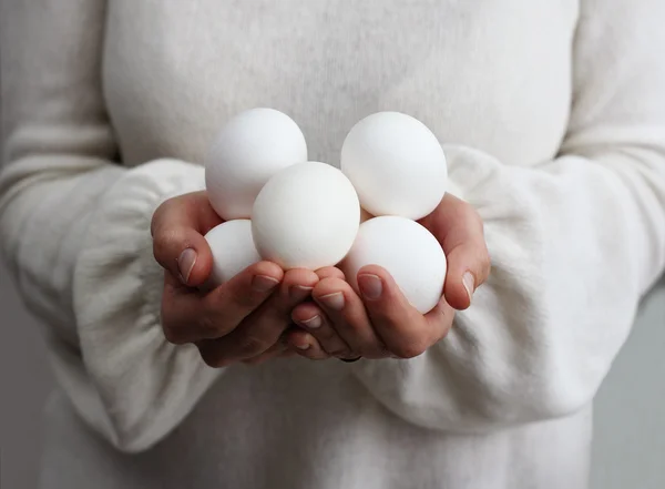 Stock image Woman holding eggs. Concept - Simple Life.