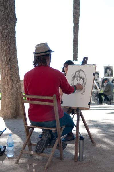 Pintor de retrato em local público. Palma Maiorca, Espanha Fotografia De Stock
