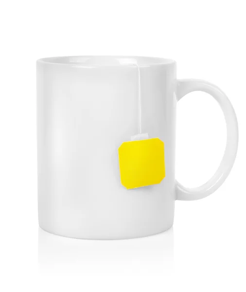 Weiße Tasse mit Teebeutel — Stockfoto