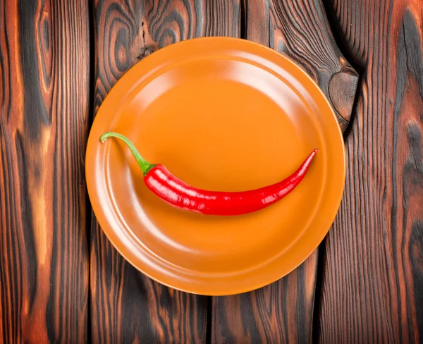 Pepper and plate — Stock Photo, Image