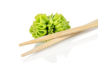 Wooden chopsticks and wasab clipart